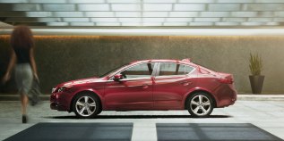 2014-ilx-exterior-6-speed-manual-with-premium-package-in-crimson-garnet-red-head-woman-9